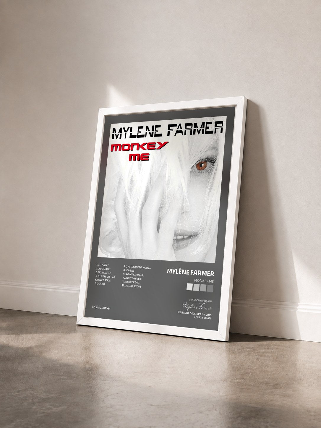 #blanc Tableau de l'album Monkey Me de Mylène Farmer vu de trois quarts, cadre blanc