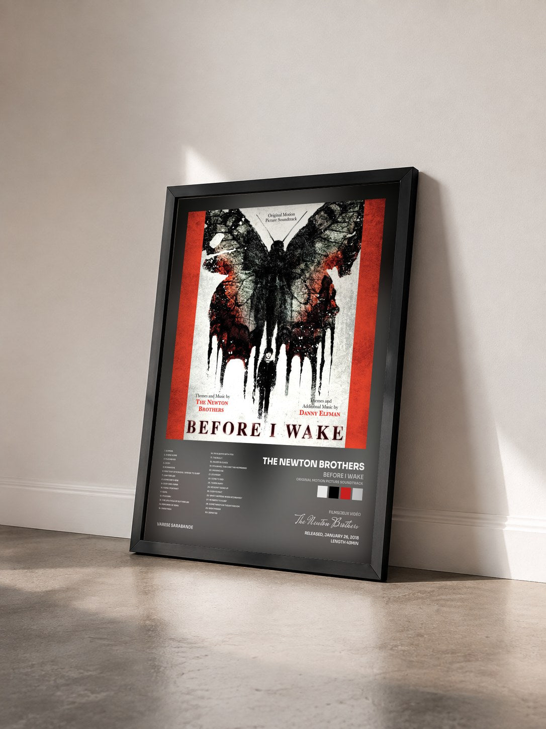 #noir Tableau de l'album Before I Wake (Original Motion Picture Soundtrack) de The Newton Brothers vu de trois quarts, cadre noir