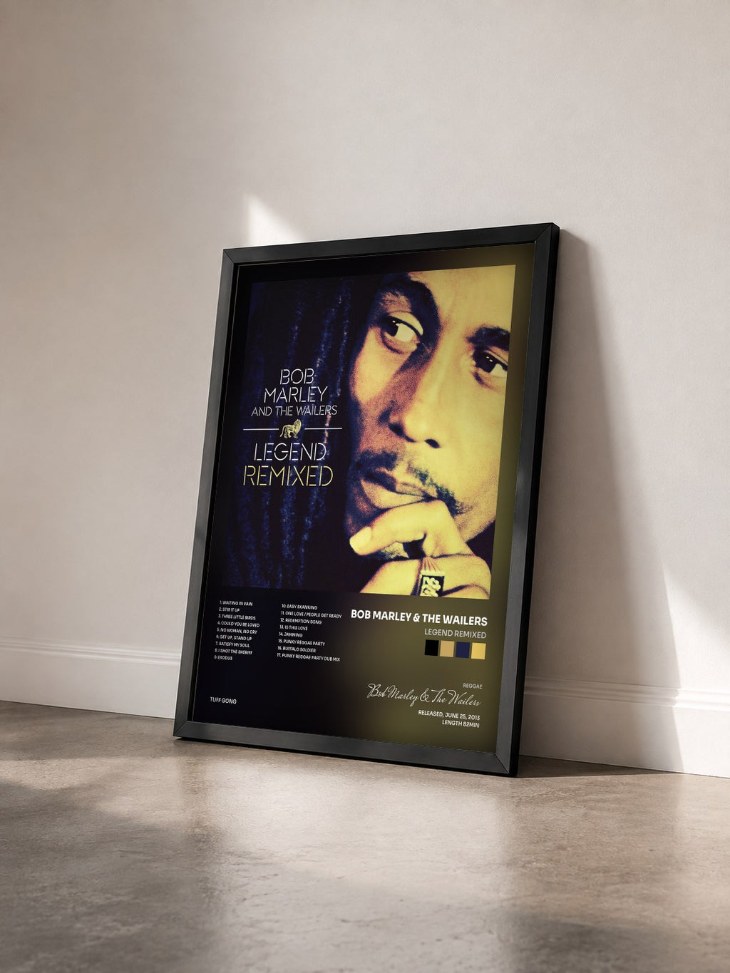 #noir Tableau de l'album Legend Remixed de Bob Marley & The Wailers vu de trois quarts, cadre noir