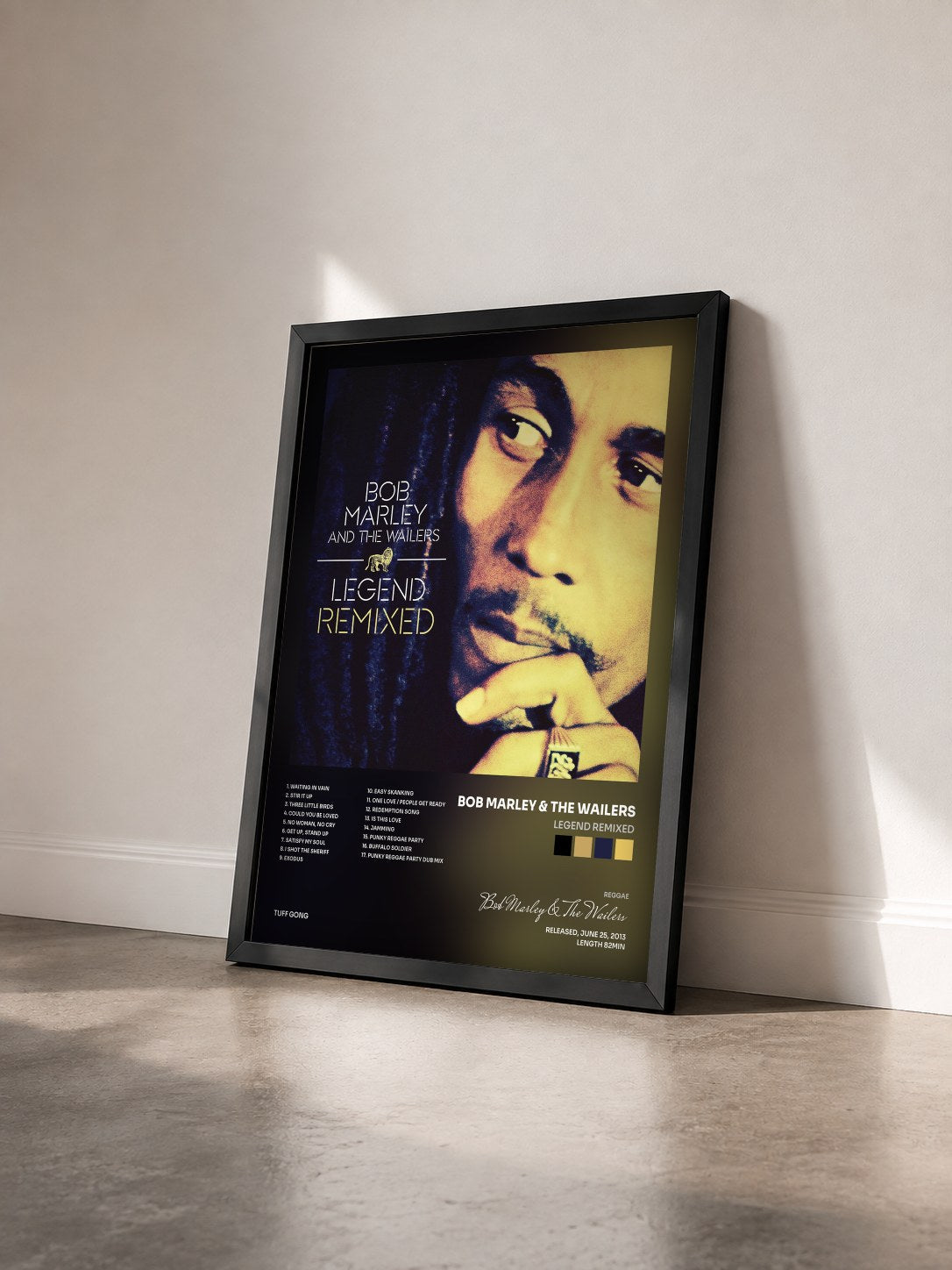 #noir Tableau de l'album Legend Remixed de Bob Marley & The Wailers vu de trois quarts, cadre noir