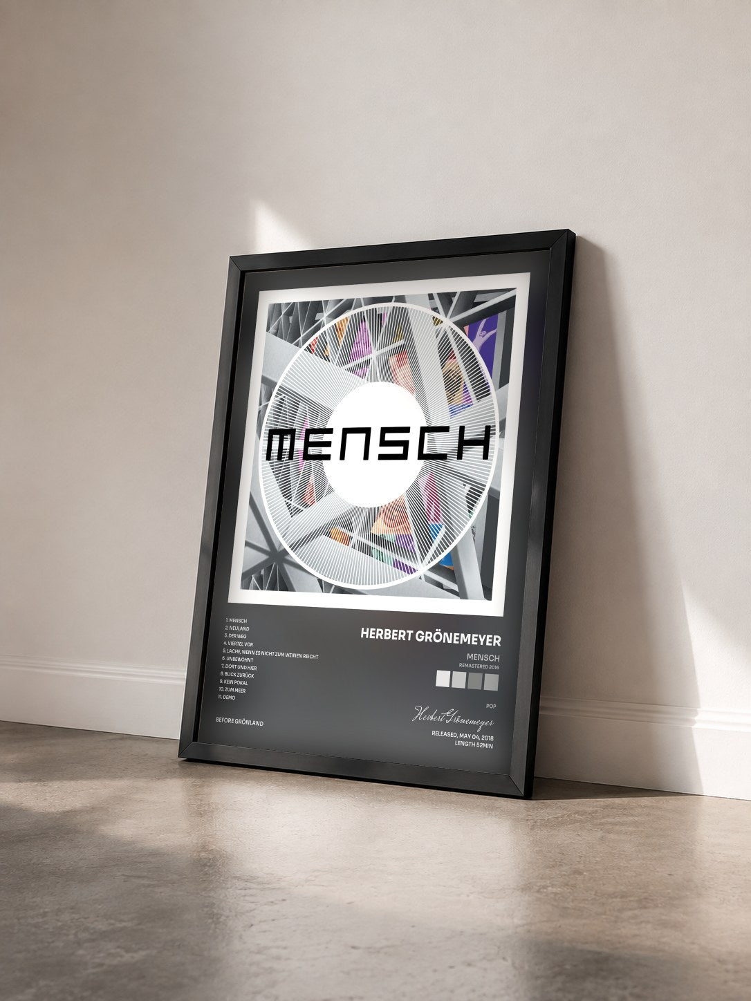 #noir Tableau de l'album Mensch (Remastered 2016) de Herbert Grönemeyer vu de trois quarts, cadre noir
