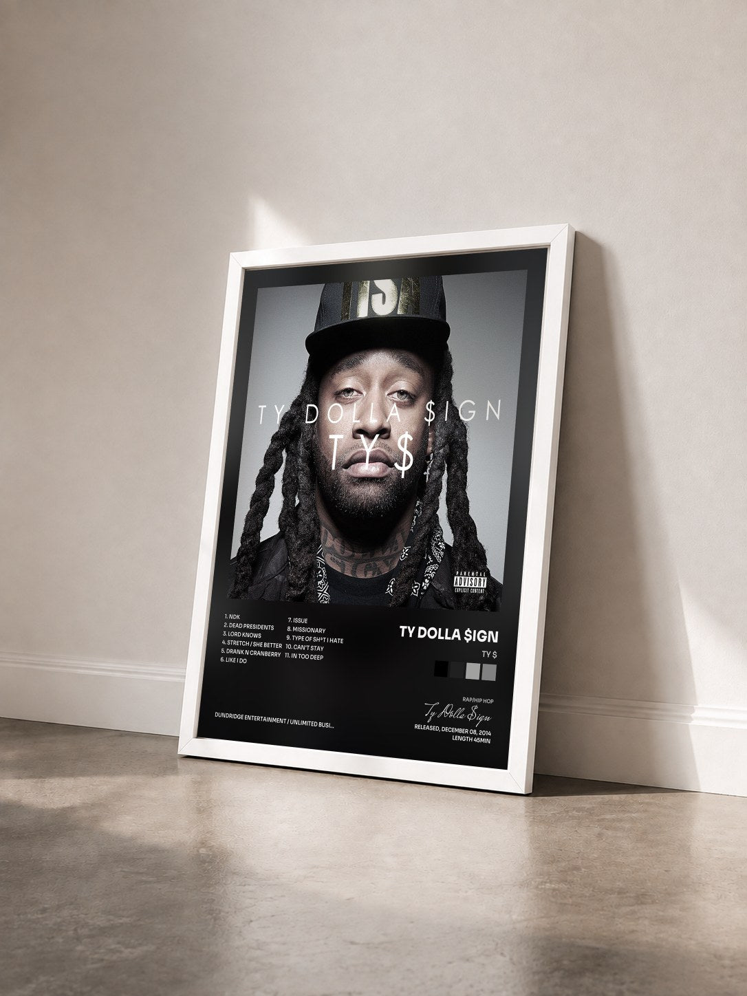 #blanc Tableau de l'album Ty $ de Ty Dolla $ign vu de trois quarts, cadre blanc