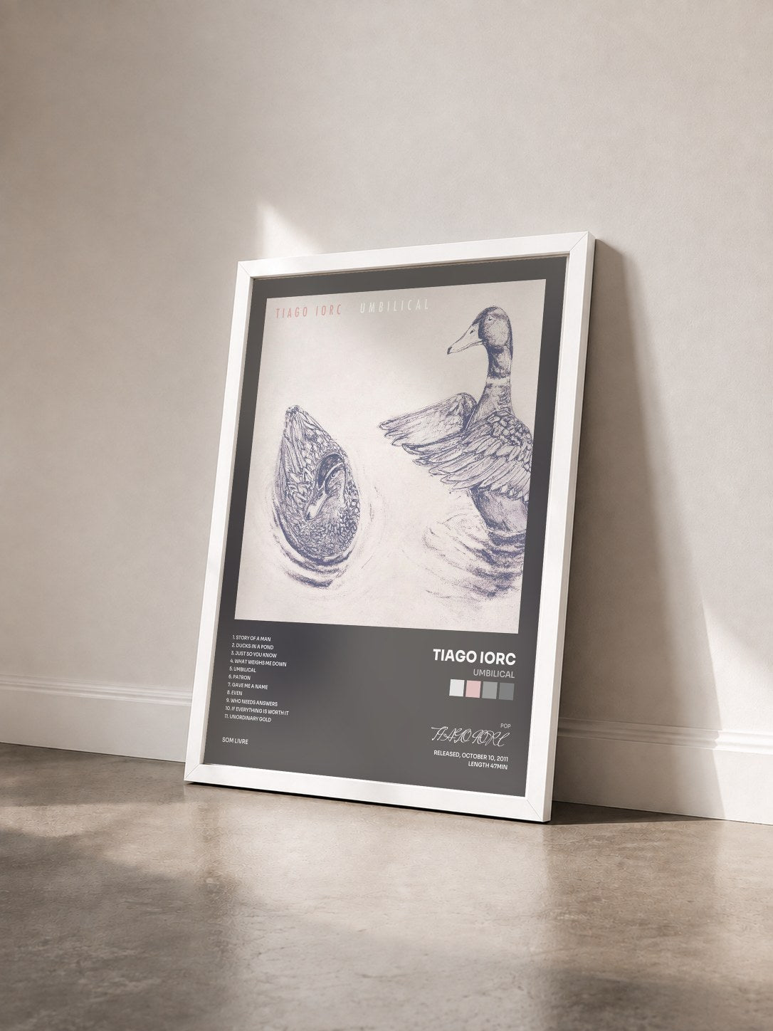 #blanc Tableau de l'album Umbilical de TIAGO IORC vu de trois quarts, cadre blanc