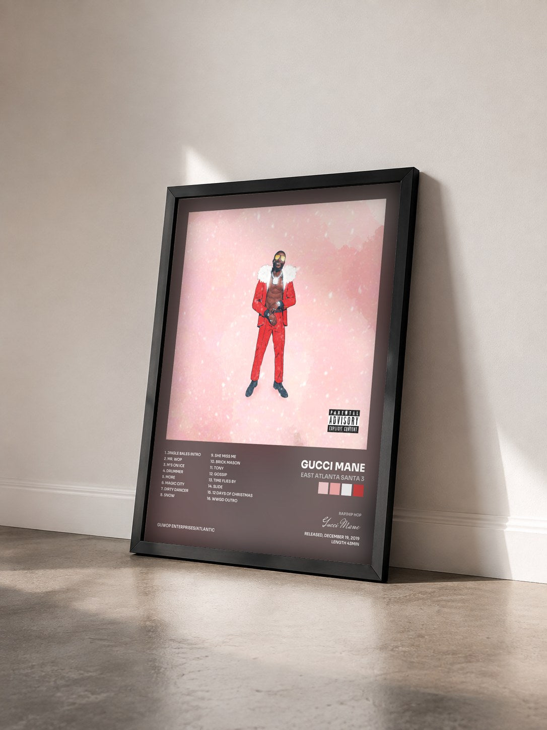#noir Tableau de l'album East Atlanta Santa 3 de Gucci Mane vu de trois quarts, cadre noir