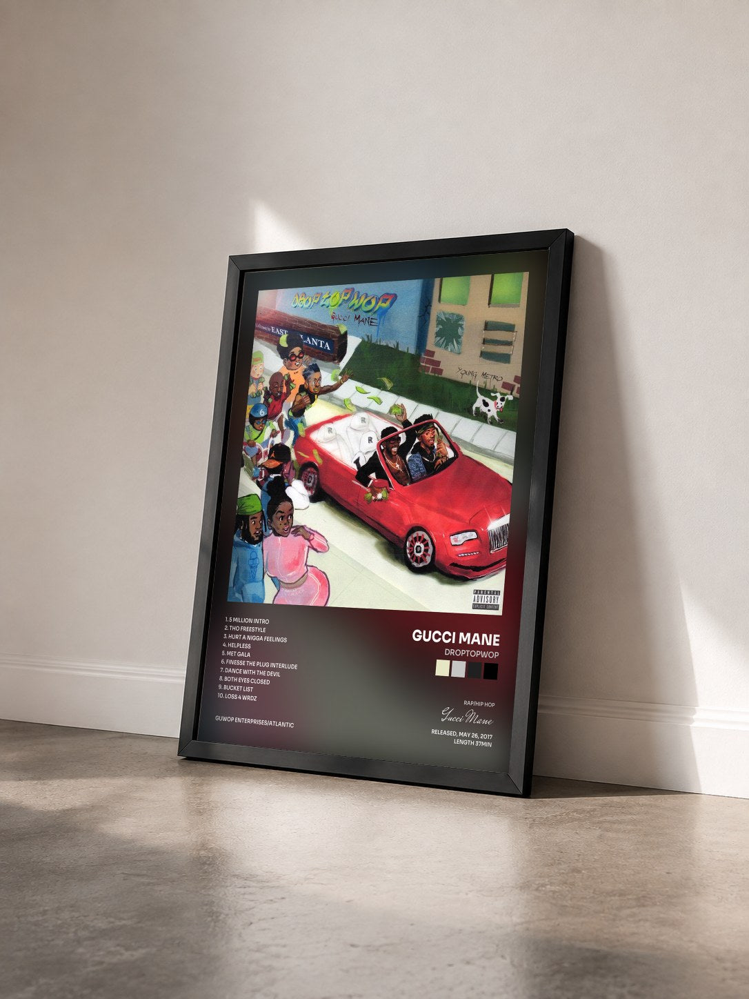 #noir Tableau de l'album Droptopwop de Gucci Mane vu de trois quarts, cadre noir