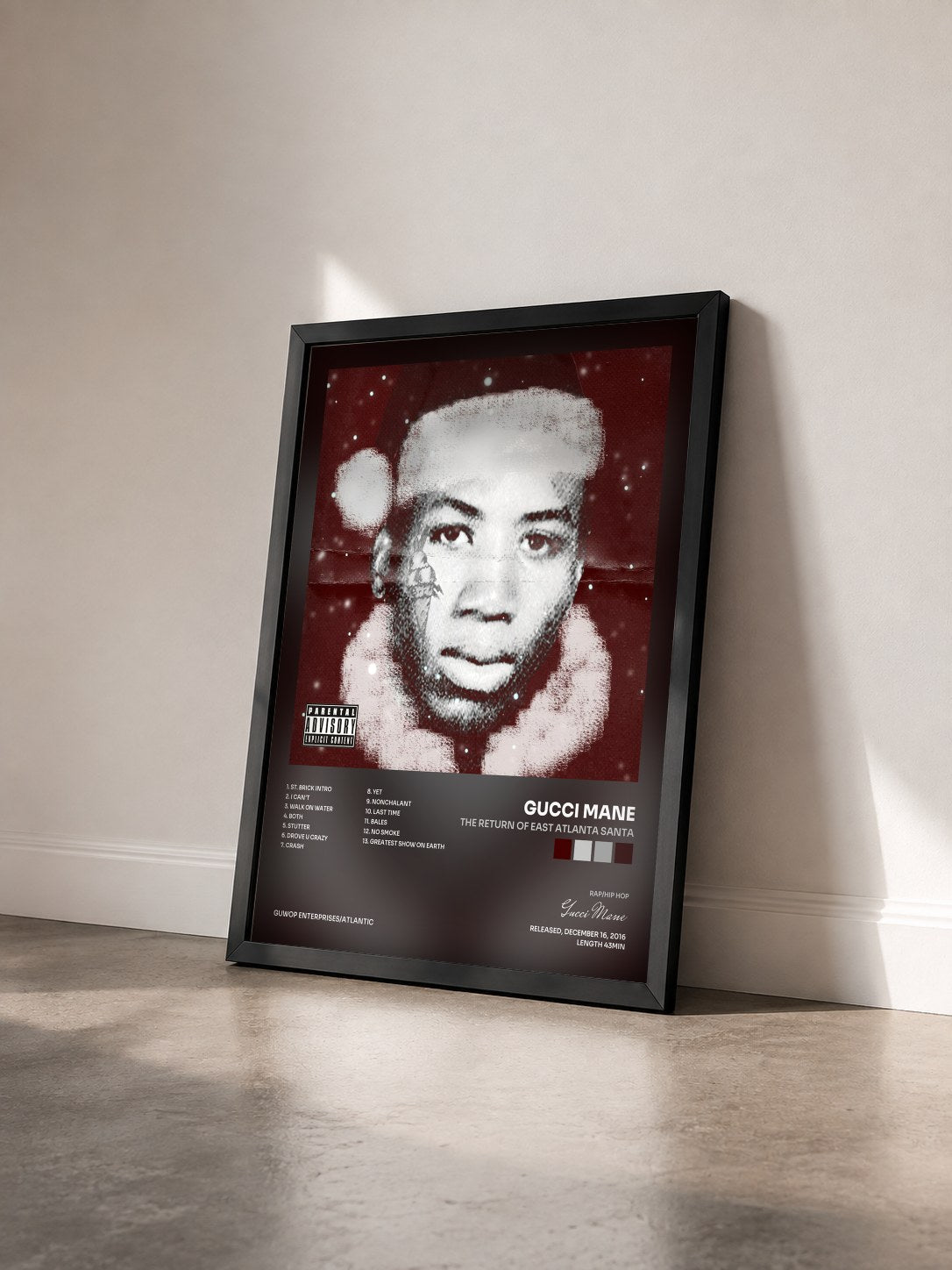 #noir Tableau de l'album The Return of East Atlanta Santa de Gucci Mane vu de trois quarts, cadre noir