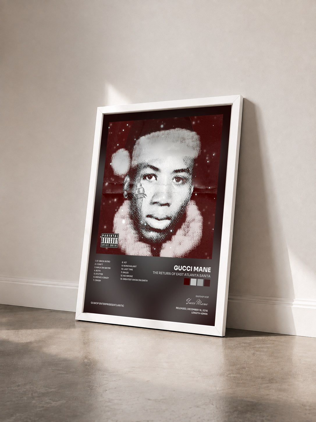 #blanc Tableau de l'album The Return of East Atlanta Santa de Gucci Mane vu de trois quarts, cadre blanc