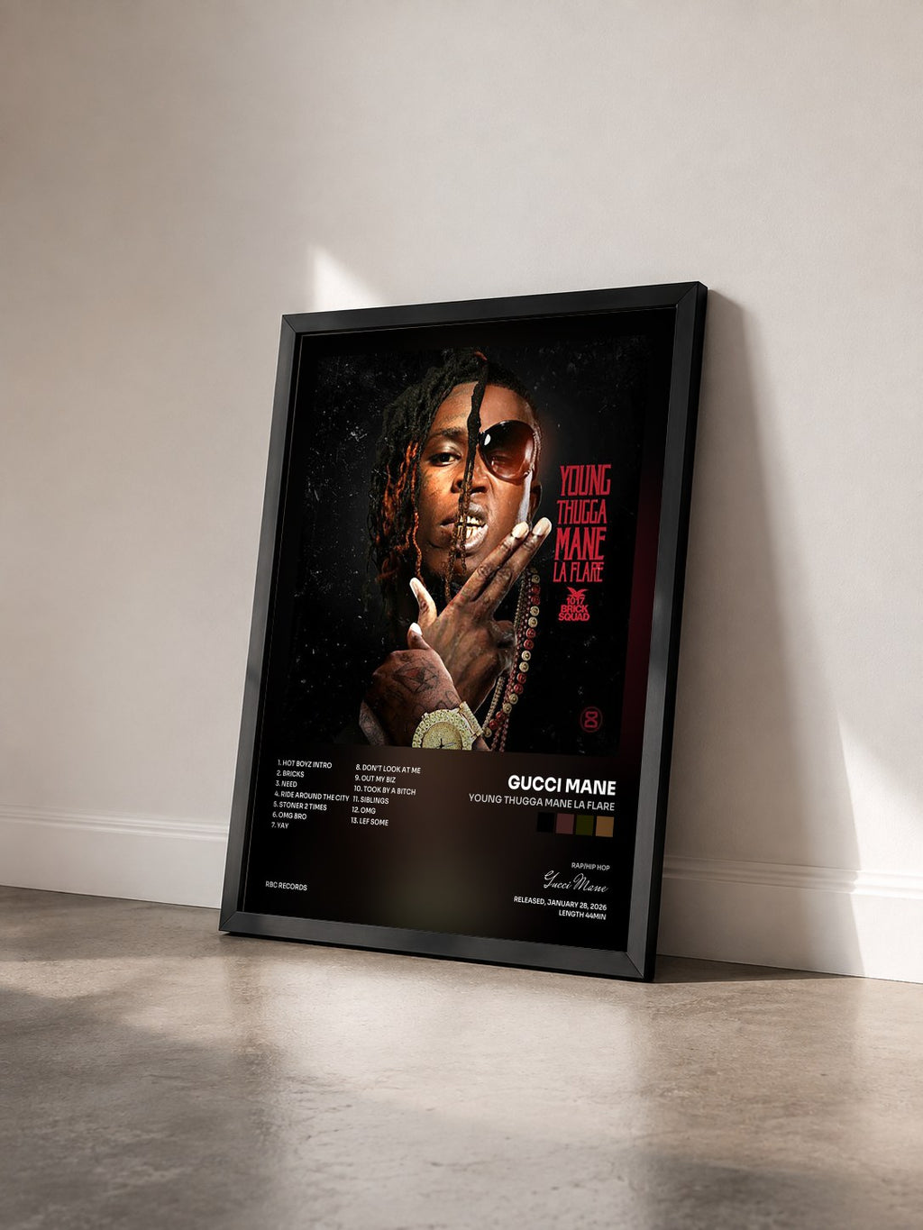 #noir Young Thugga Mane La Flare by Gucci Mane as a framed art print seen at an angle, black frame