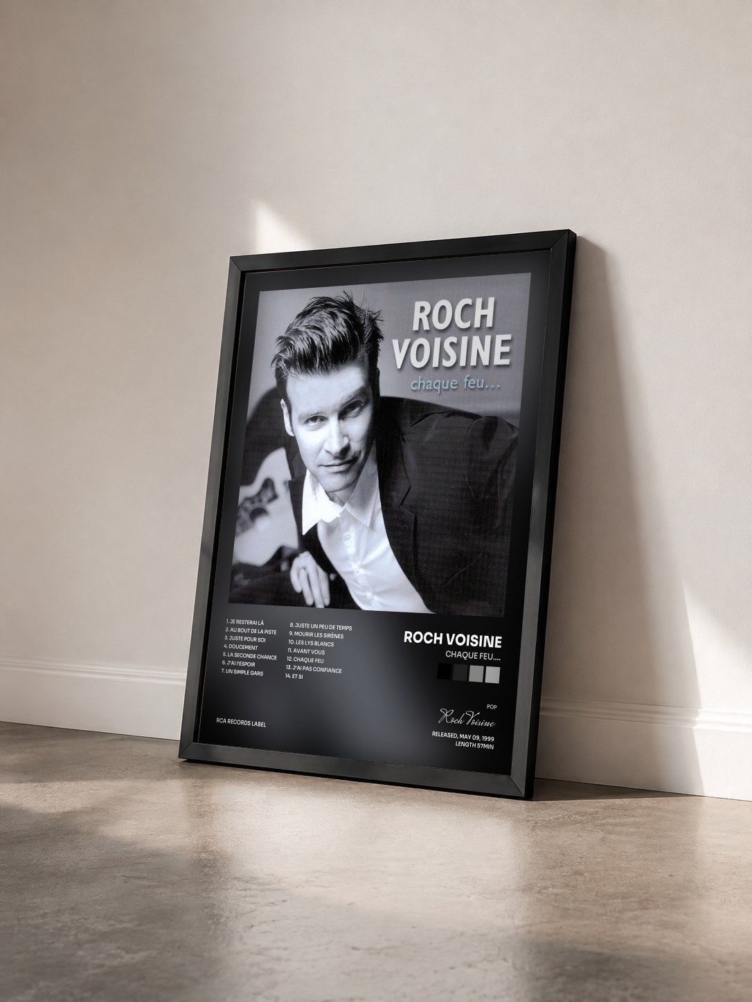 #noir Tableau de l'album Chaque Feu.... de Roch Voisine vu de trois quarts, cadre noir
