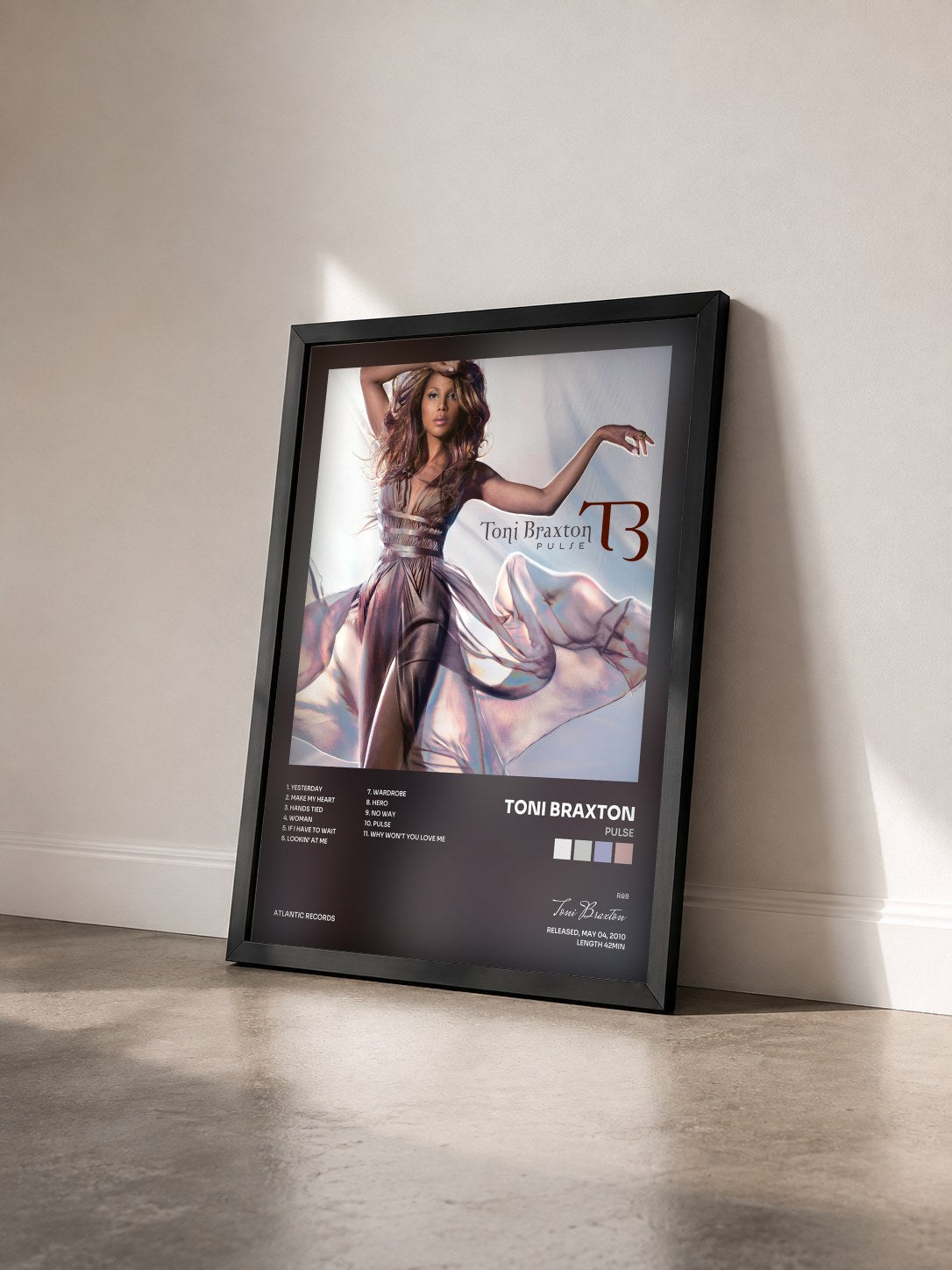 #noir Pulse by Toni Braxton as a framed art print seen at an angle, black frame