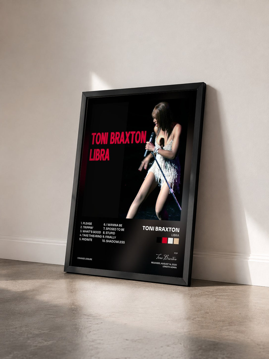 #noir Libra by Toni Braxton as a framed art print seen at an angle, black frame