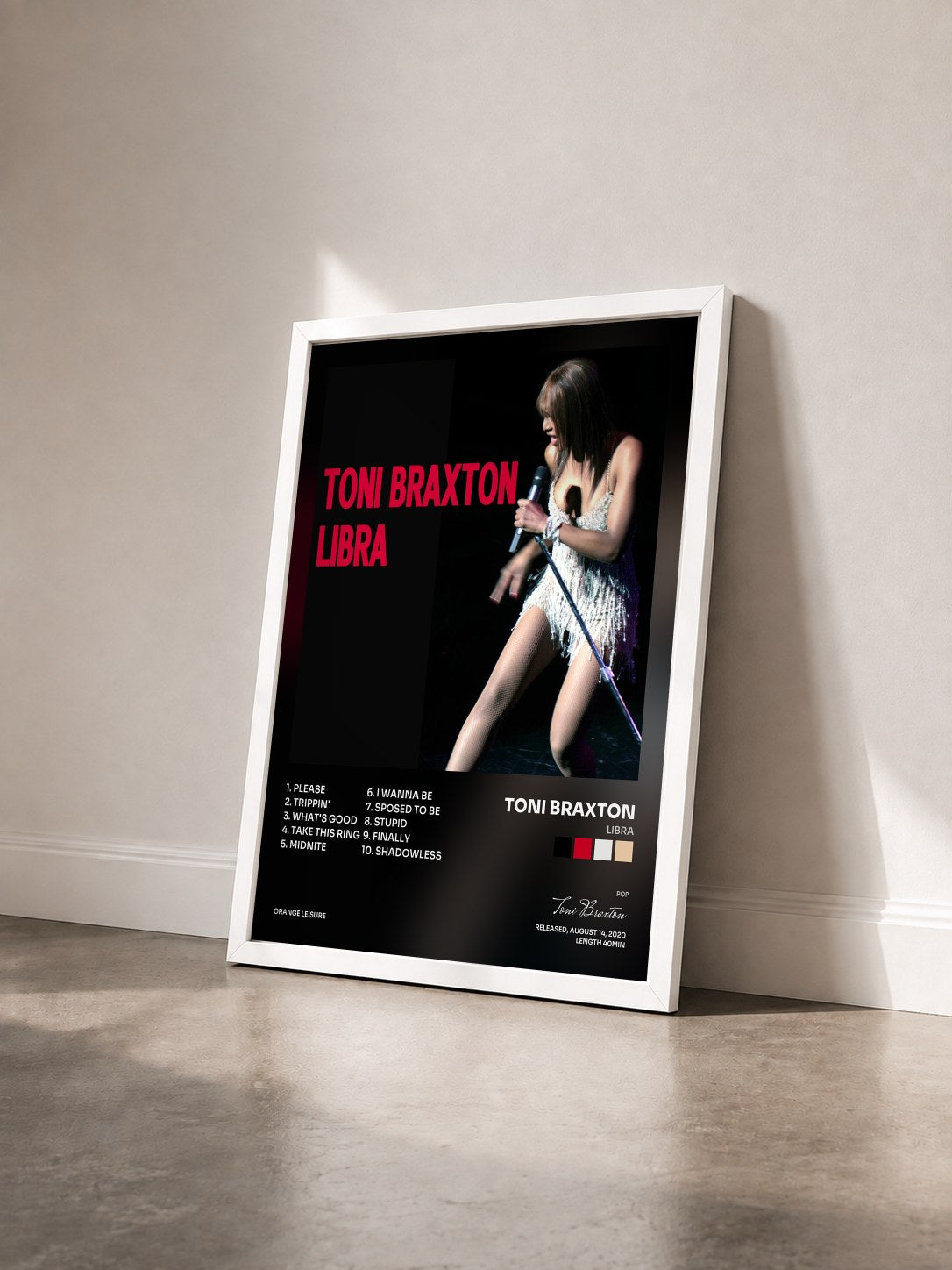 #blanc Libra by Toni Braxton as a framed art print seen at an angle, white frame