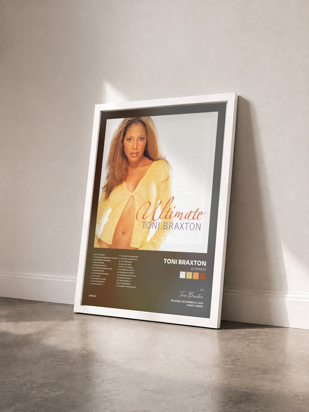 #blanc Ultimate by Toni Braxton as a framed art print seen at an angle, white frame