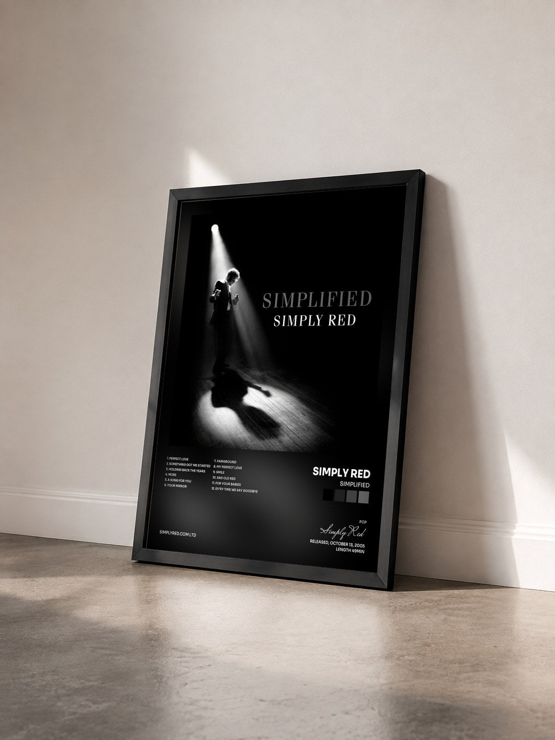 #noir Simplified by Simply Red as a framed art print seen at an angle, black frame