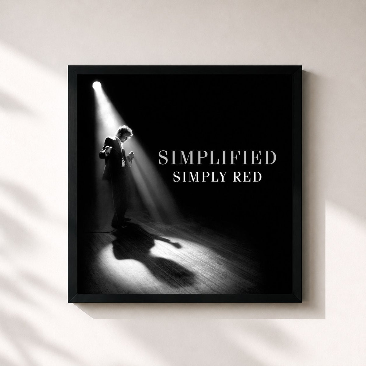 #noir Simplified (Remastered & Expanded) by Simply Red as a square framed art print, black 32x32 cm frame