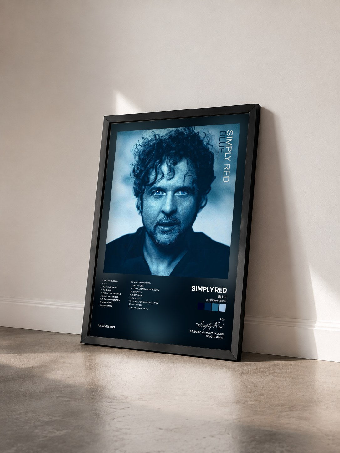 #noir Blue (Expanded Version) by Simply Red as a framed art print seen at an angle, black frame