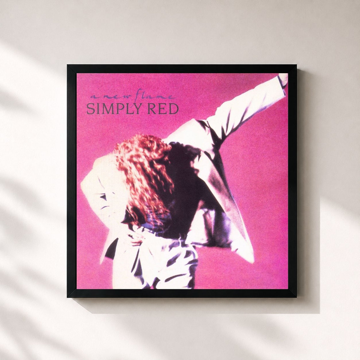 #noir A New Flame (Expanded Version) by Simply Red as a square framed art print, black 32x32 cm frame