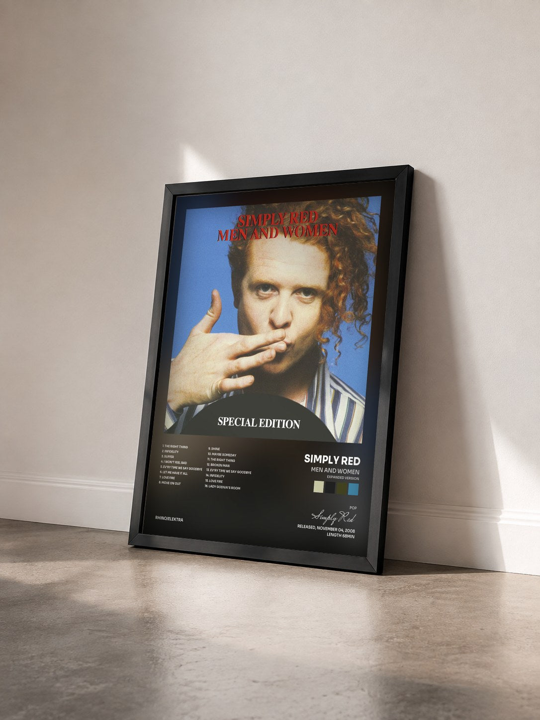 #noir Men and Women (Expanded Version) by Simply Red as a framed art print seen at an angle, black frame