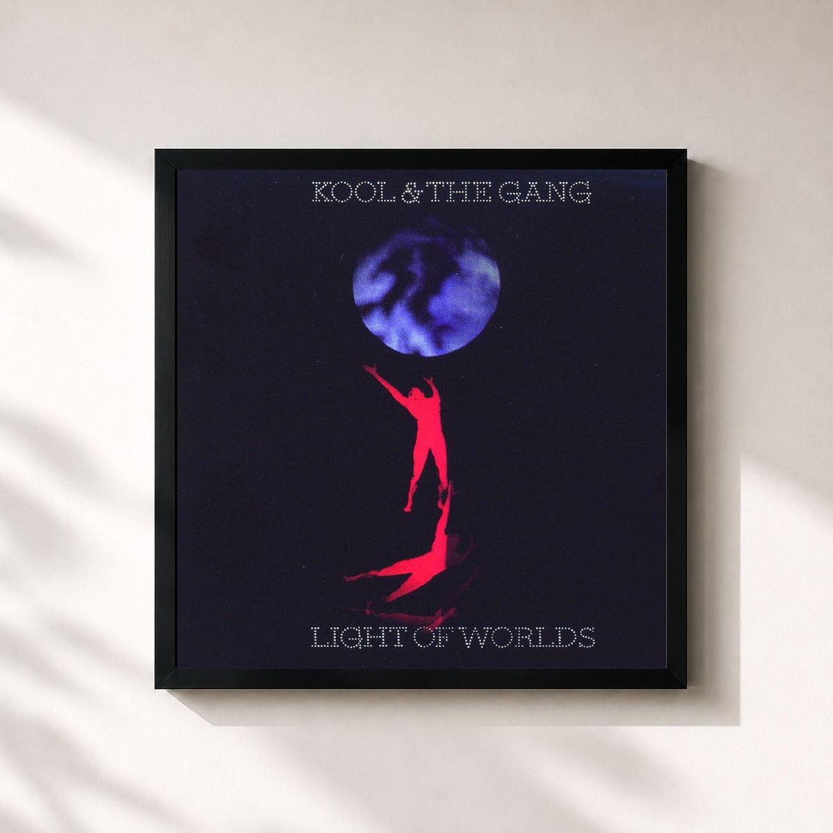 #noir Light Of Worlds von Kool & The Gang als quadratischer Kunstdruck, schwarzer Rahmen 32x32 cm