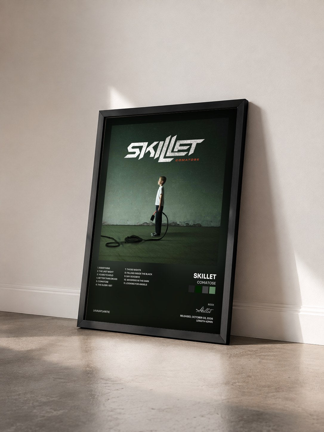 #noir Tableau de l'album Comatose de Skillet vu de trois quarts, cadre noir