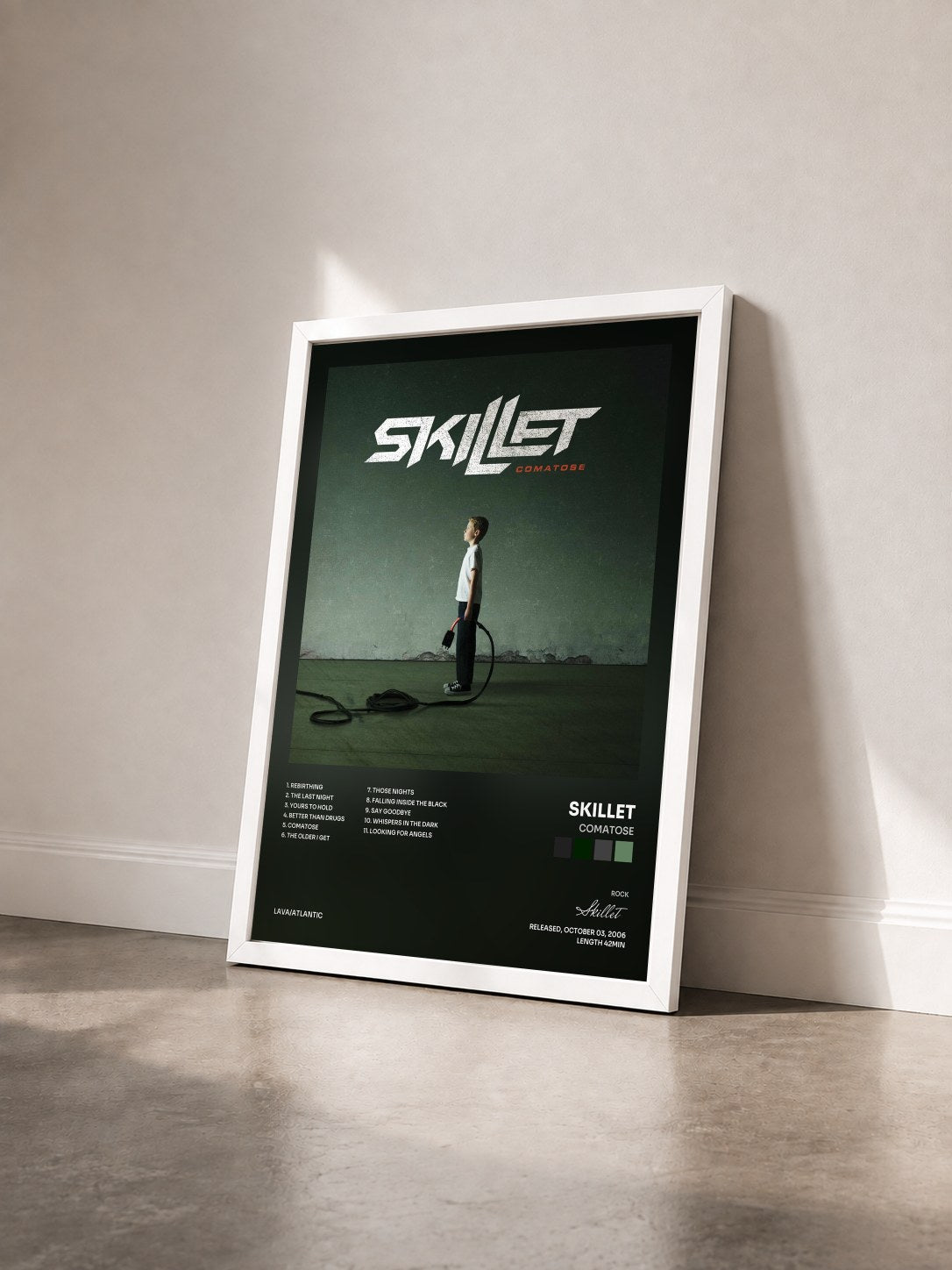 #blanc Tableau de l'album Comatose de Skillet vu de trois quarts, cadre blanc