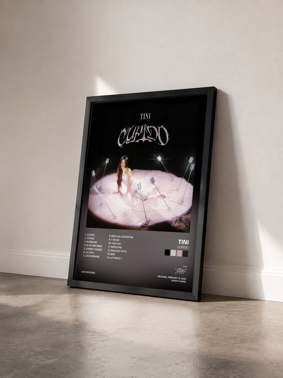 #noir Cupido by TINI as a framed art print seen at an angle, black frame
