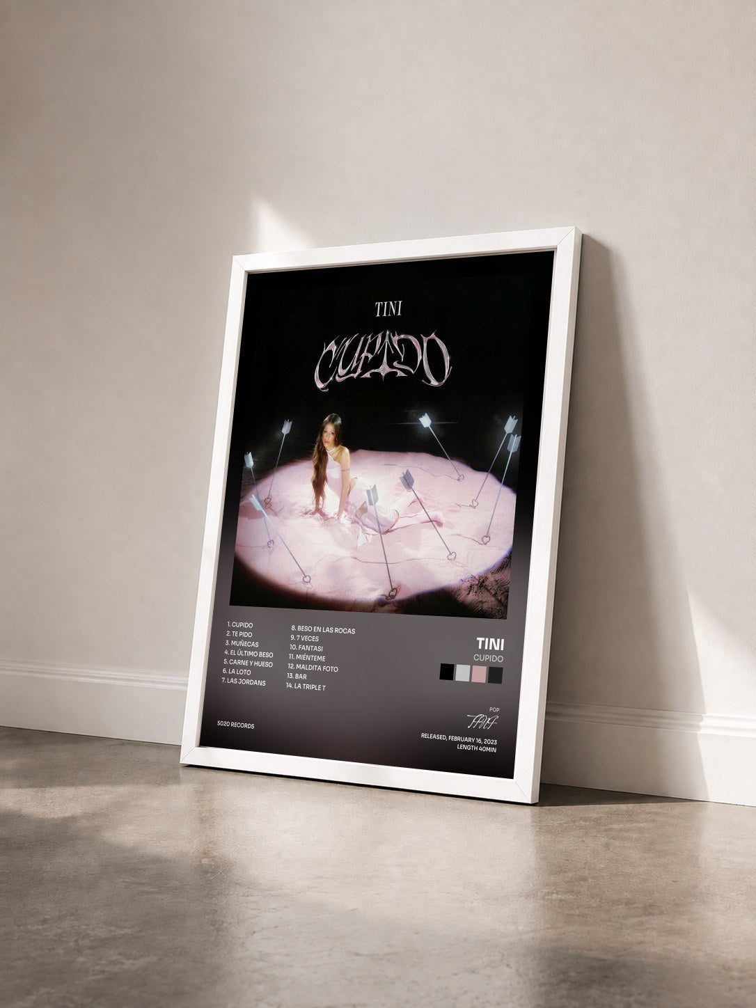 #blanc Cupido by TINI as a framed art print seen at an angle, white frame