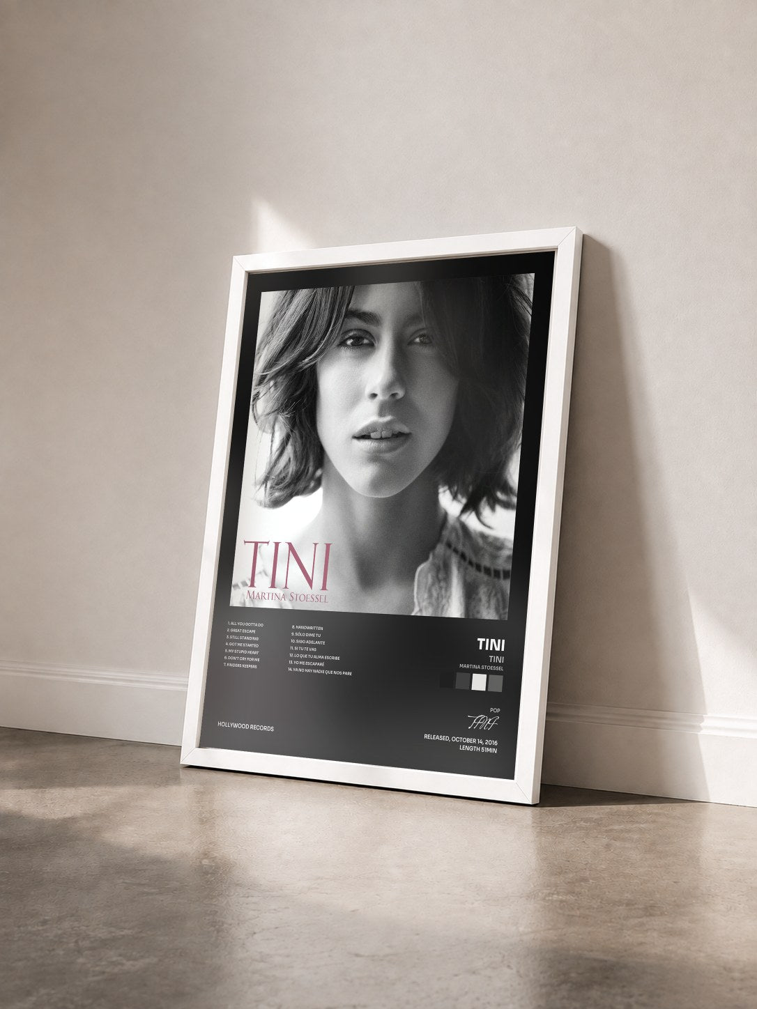 #blanc TINI (Martina Stoessel) by TINI as a framed art print seen at an angle, white frame