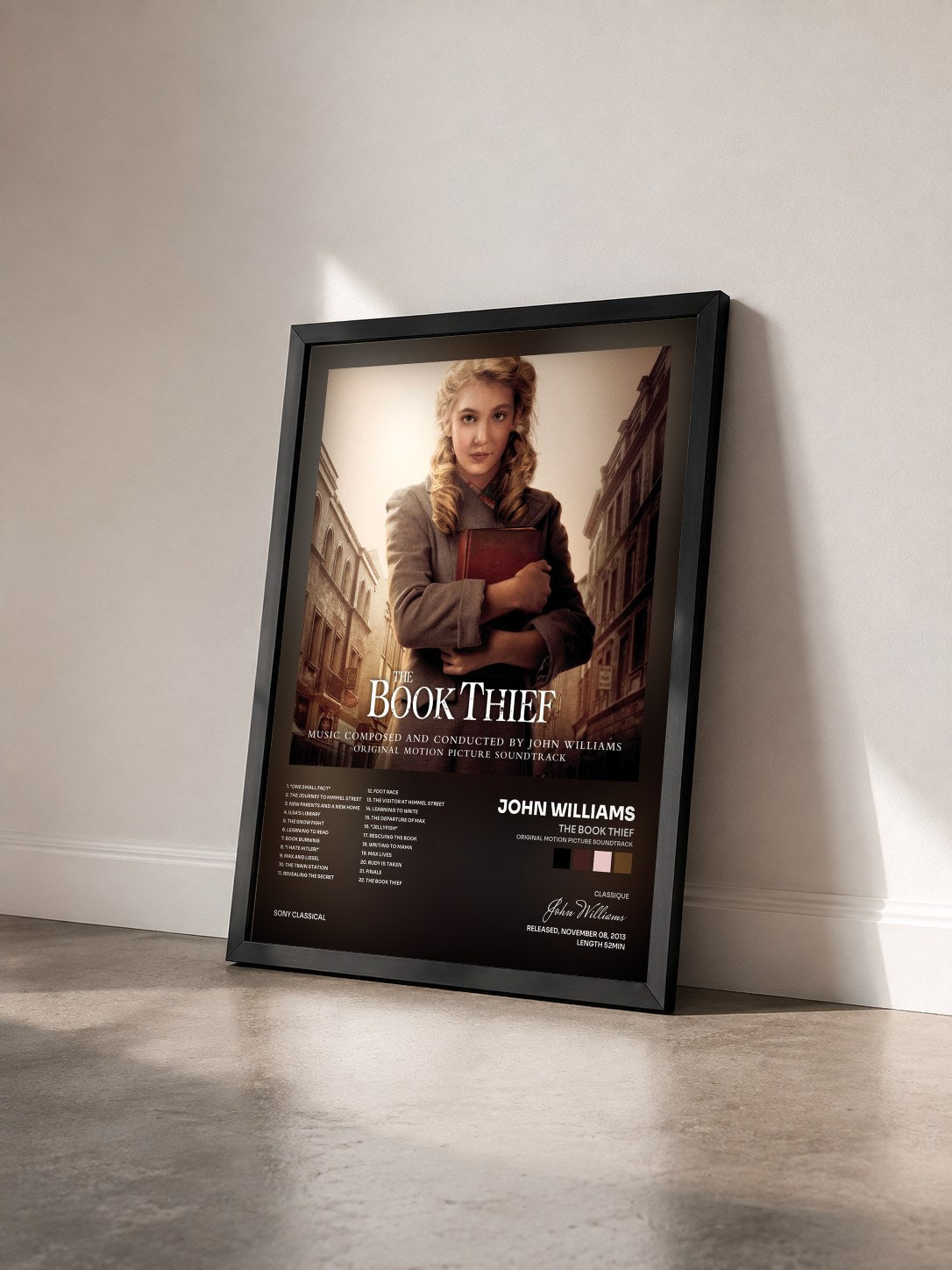 #noir Tableau de l'album The Book Thief (Original Motion Picture Soundtrack) de John Williams vu de trois quarts, cadre noir
