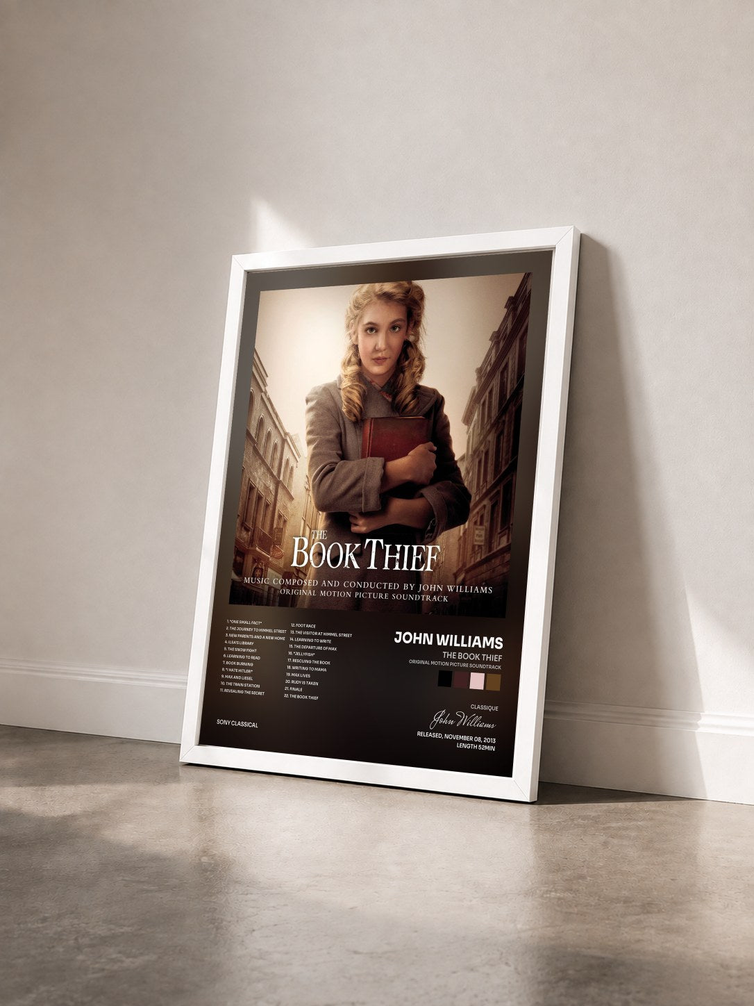 #blanc Tableau de l'album The Book Thief (Original Motion Picture Soundtrack) de John Williams vu de trois quarts, cadre blanc