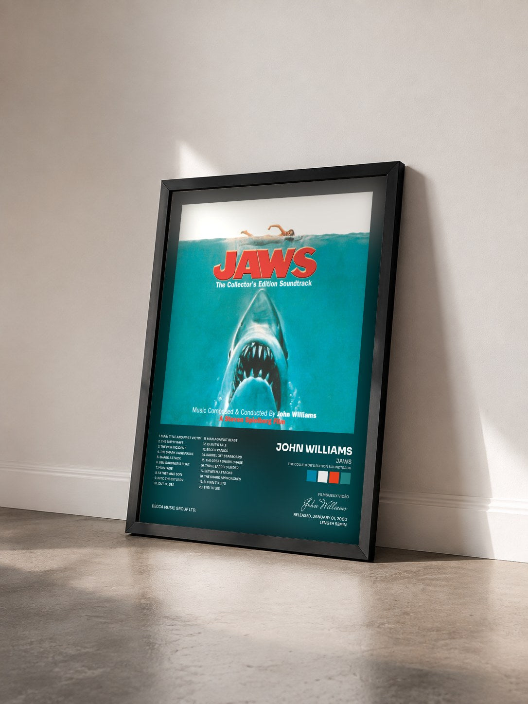 #noir Tableau de l'album Jaws (The Collector's Edition Soundtrack) de John Williams vu de trois quarts, cadre noir