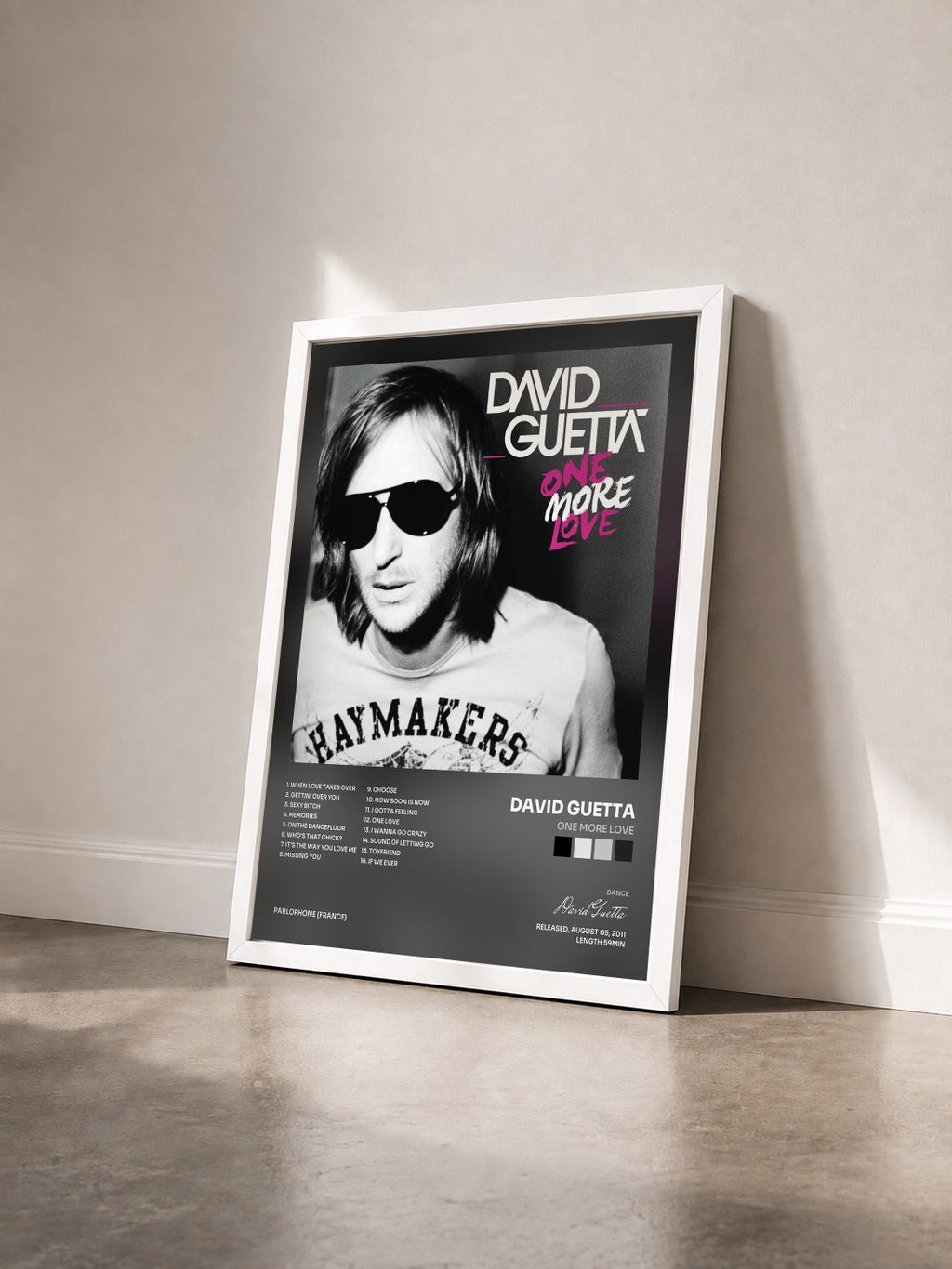 #blanc Tableau de l'album One More Love de David Guetta vu de trois quarts, cadre blanc