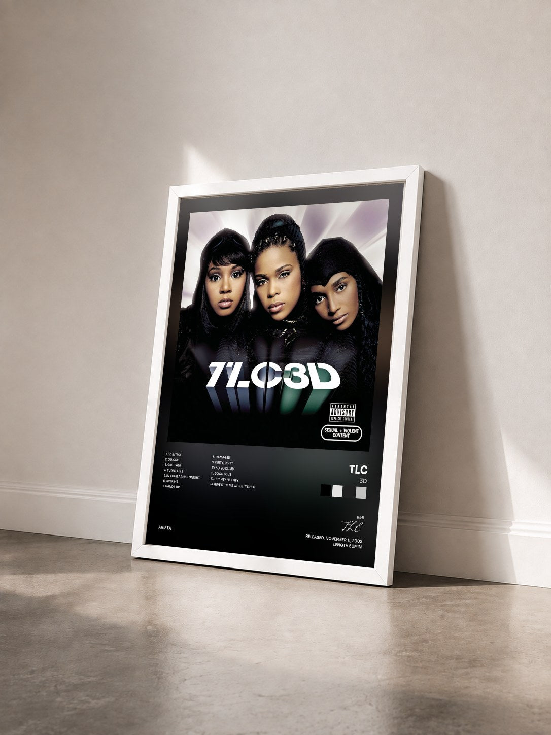 #blanc Tableau de l'album 3D de TLC vu de trois quarts, cadre blanc