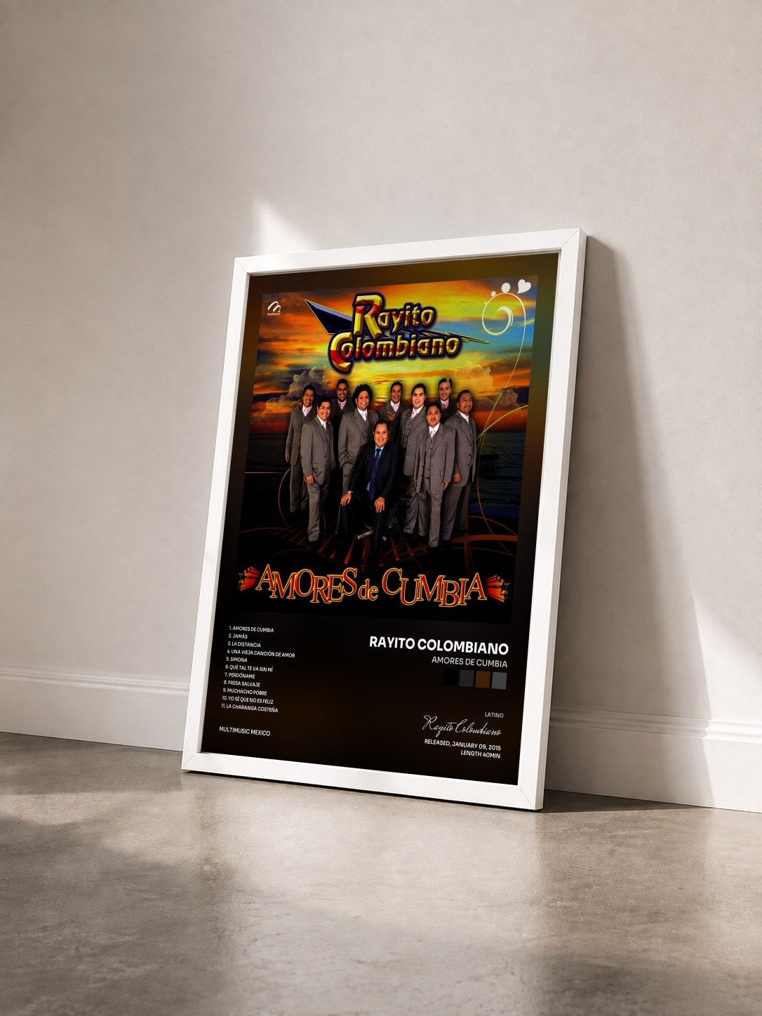 #blanc Tableau de l'album Amores de Cumbia de Rayito Colombiano vu de trois quarts, cadre blanc