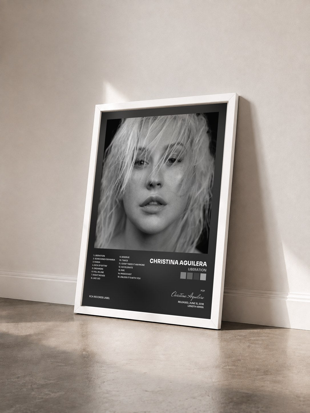 #blanc Tableau de l'album Liberation de Christina Aguilera vu de trois quarts, cadre blanc