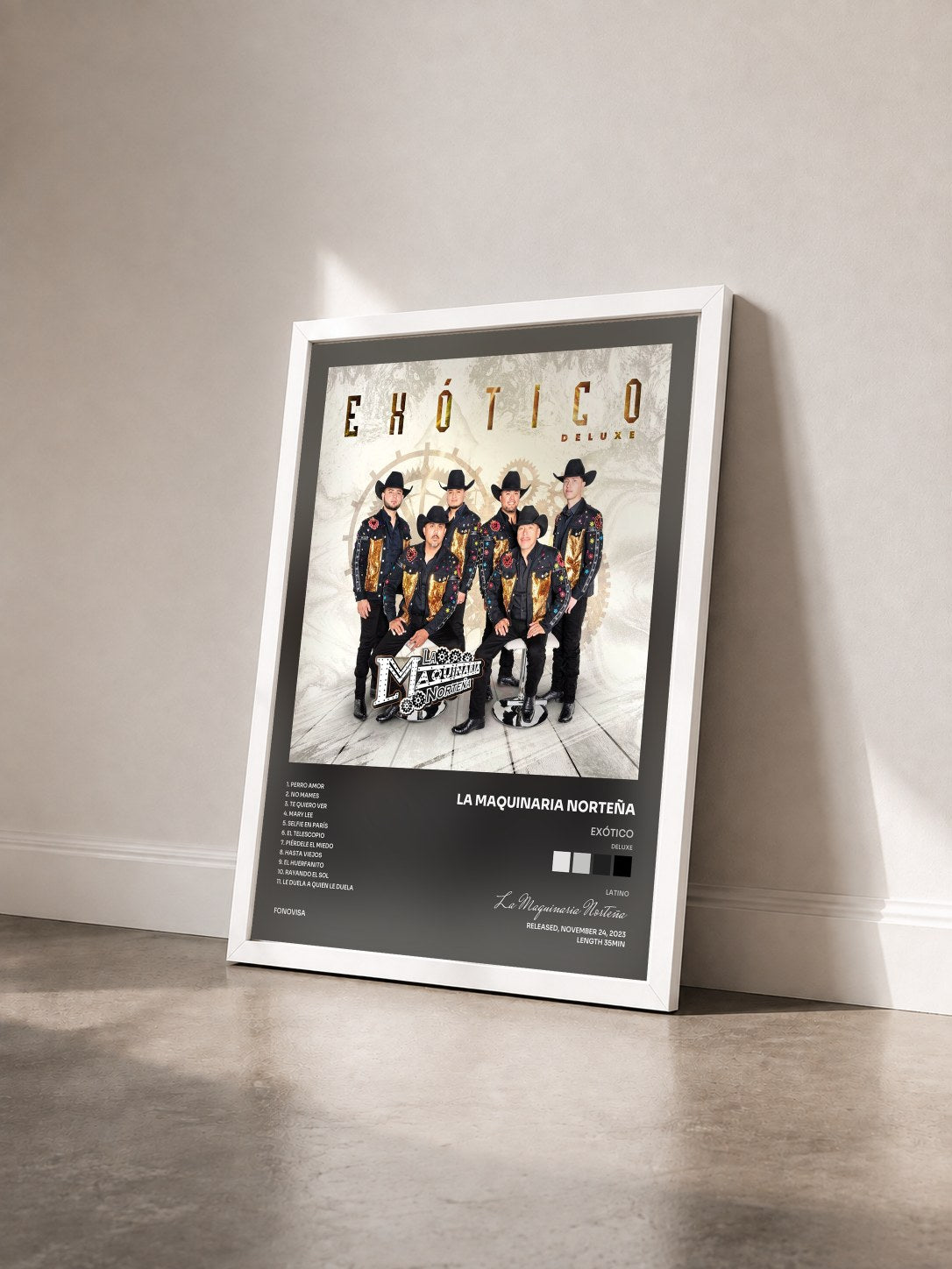 #blanc Tableau de l'album Exótico (Deluxe) de La Maquinaria Norteña vu de trois quarts, cadre blanc