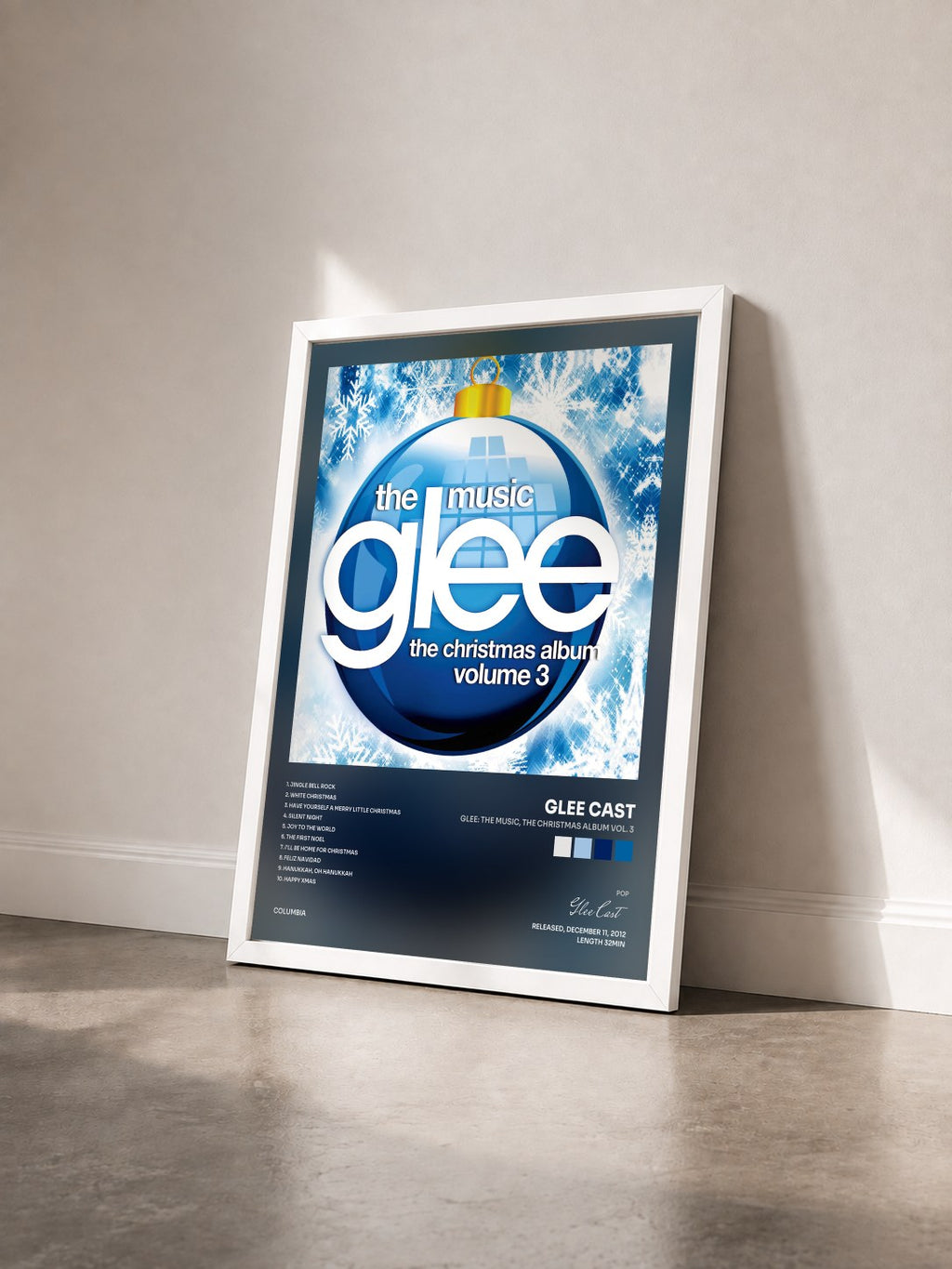 #blanc Glee: The Music, The Christmas Album Vol. 3 by Glee Cast as a framed art print seen at an angle, white frame