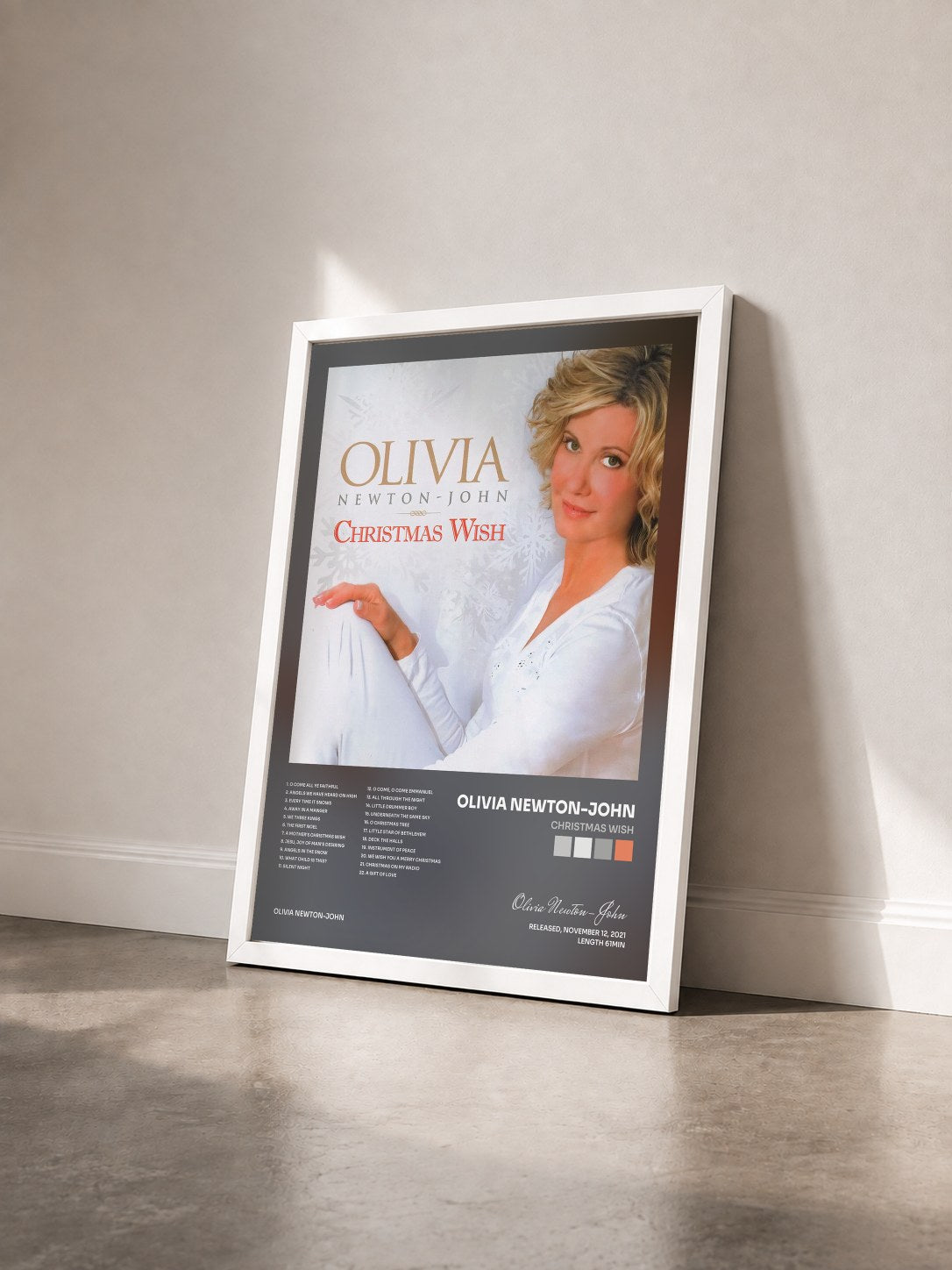 #blanc Tableau de l'album Christmas Wish de Olivia Newton-John vu de trois quarts, cadre blanc