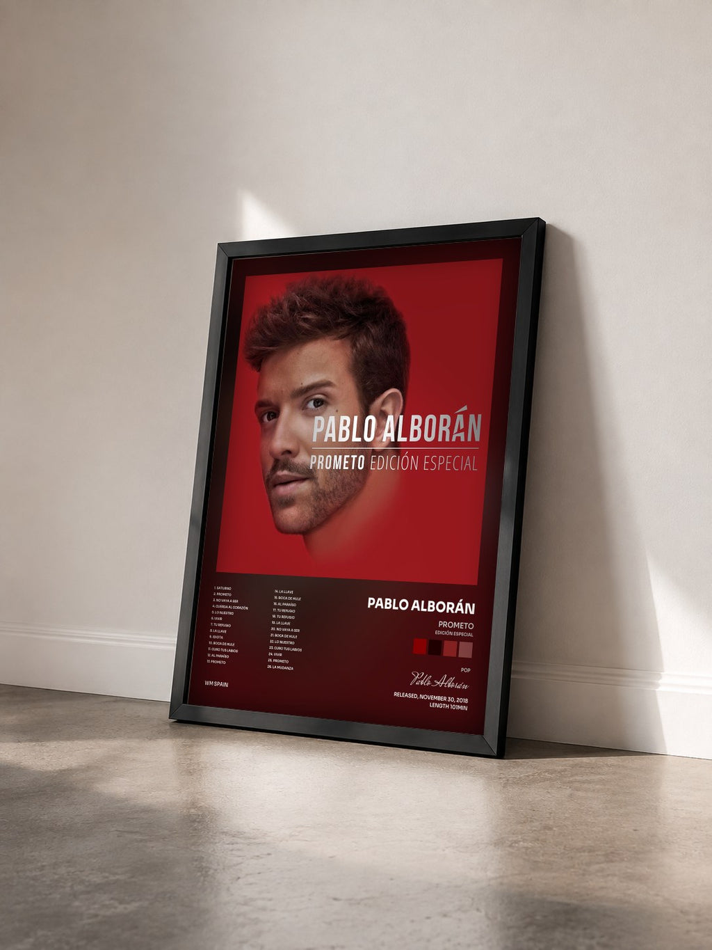 #noir Tableau de l'album Prometo (Edición especial) de Pablo Alborán vu de trois quarts, cadre noir