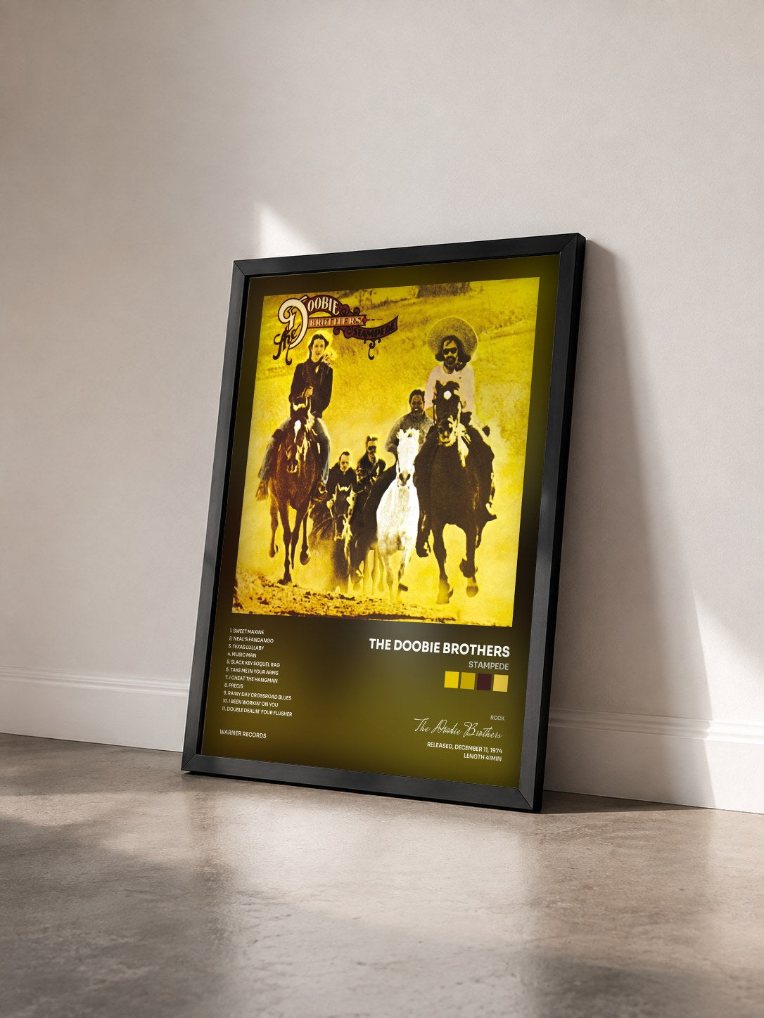 #noir Tableau de l'album Stampede de The Doobie Brothers vu de trois quarts, cadre noir