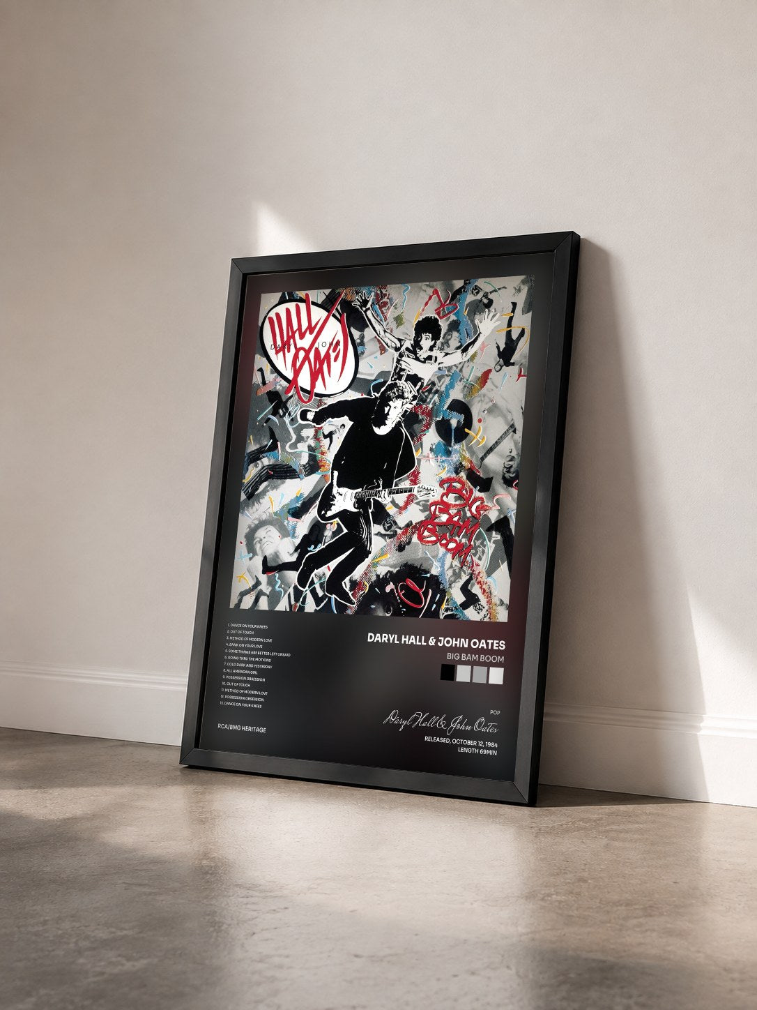 #noir Tableau de l'album Big Bam Boom de Daryl Hall & John Oates vu de trois quarts, cadre noir