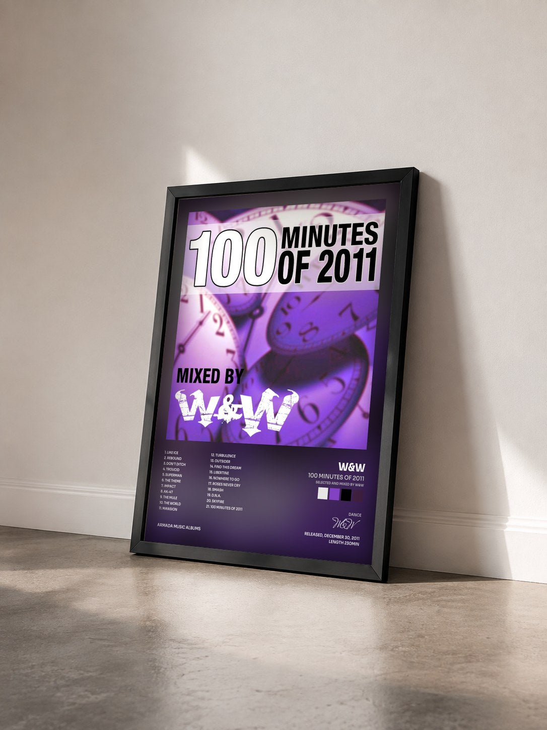 #noir Tableau de l'album 100 Minutes Of 2011 (Selected and mixed by W&W) de W&W vu de trois quarts, cadre noir