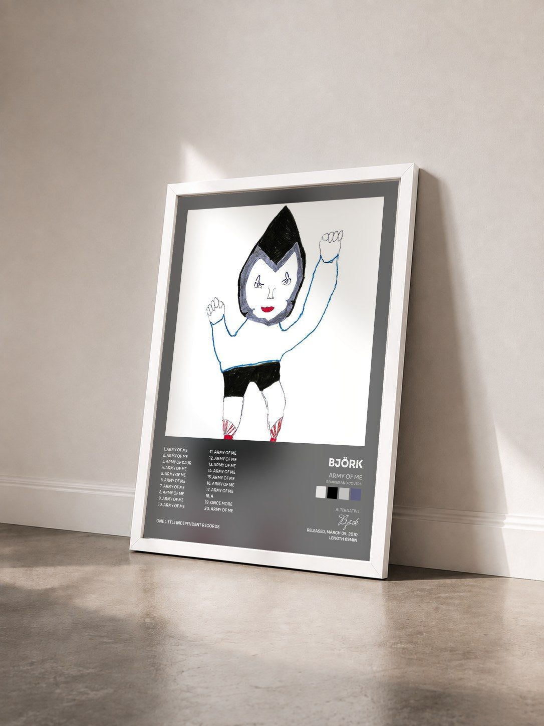 #blanc Tableau de l'album Army Of Me (Remixes And Covers) de Björk vu de trois quarts, cadre blanc
