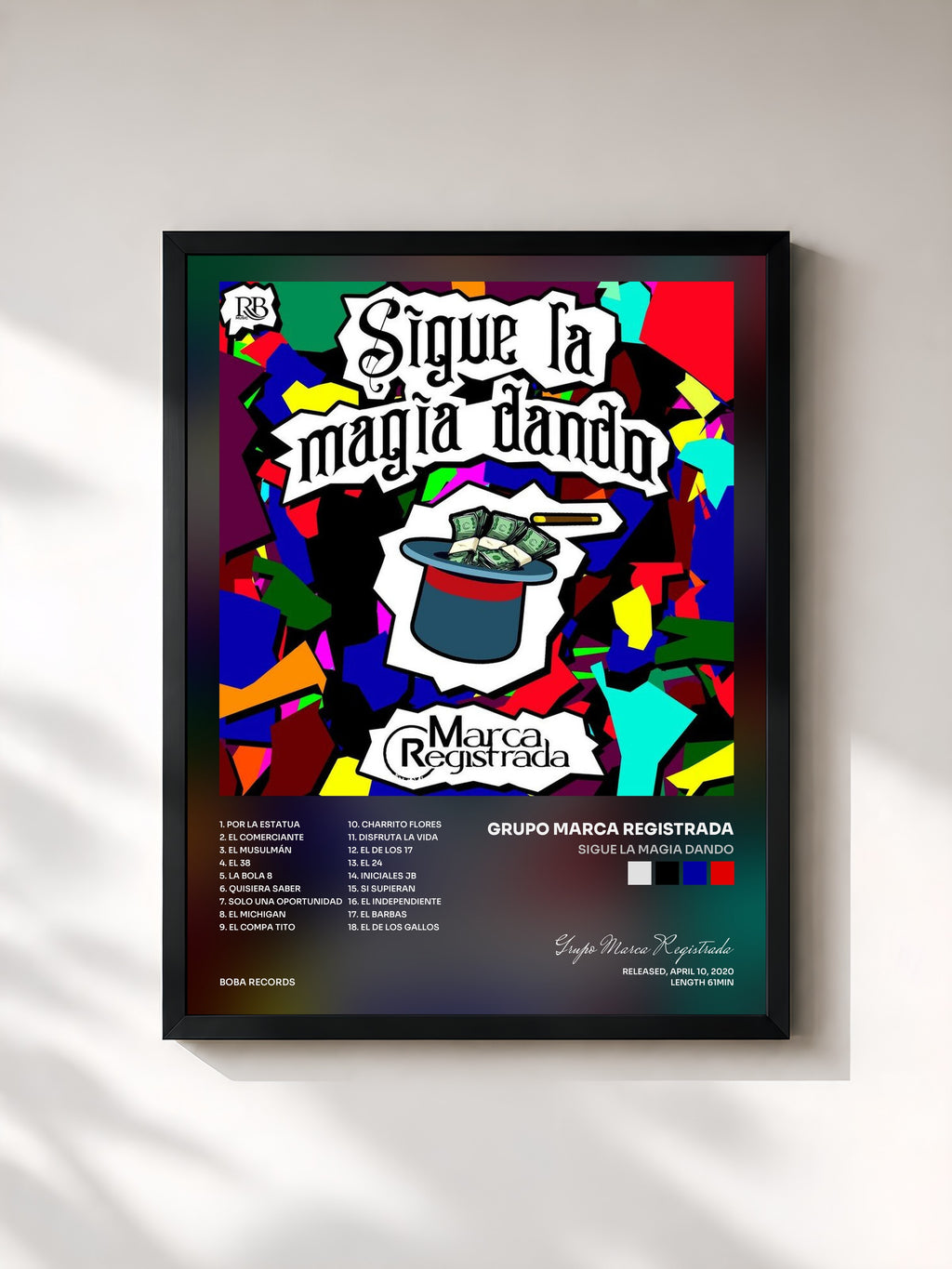 #noir Tableau de l'album Sigue La Magia Dando de Grupo Marca Registrada, cadre noir, imprimé et encadré en France