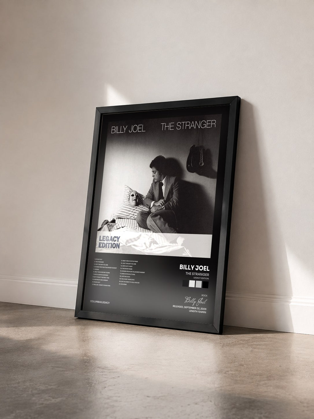 #noir Tableau de l'album The Stranger (Legacy Edition) de Billy Joel vu de trois quarts, cadre noir