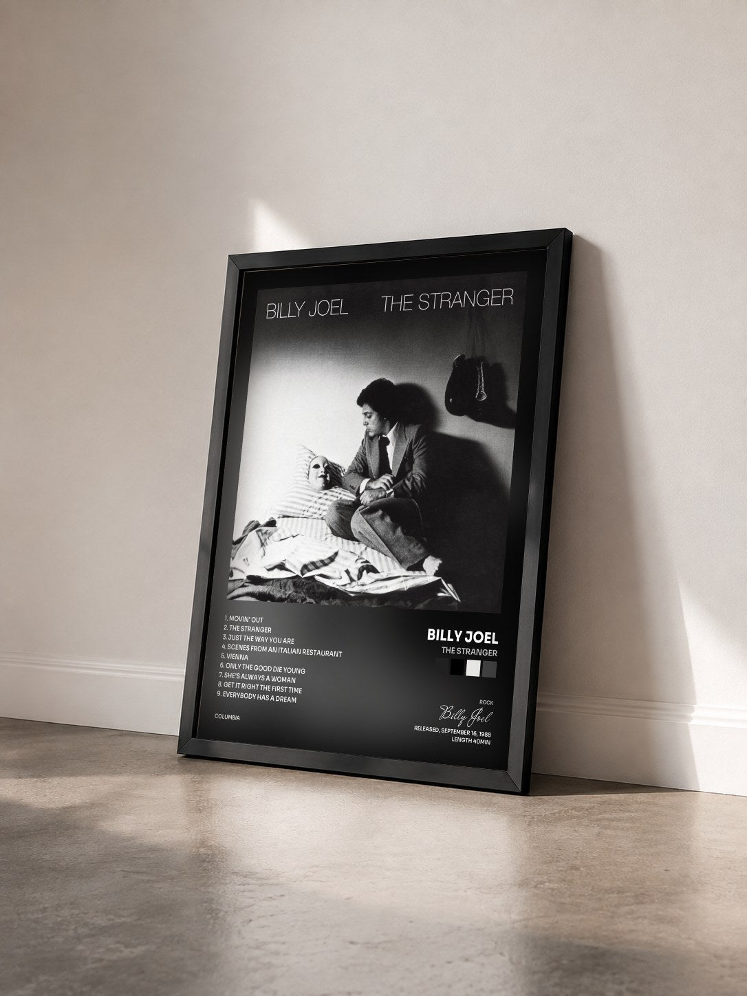 #noir The Stranger de Billy Joel en lámina enmarcada vista de tres cuartos, marco negro