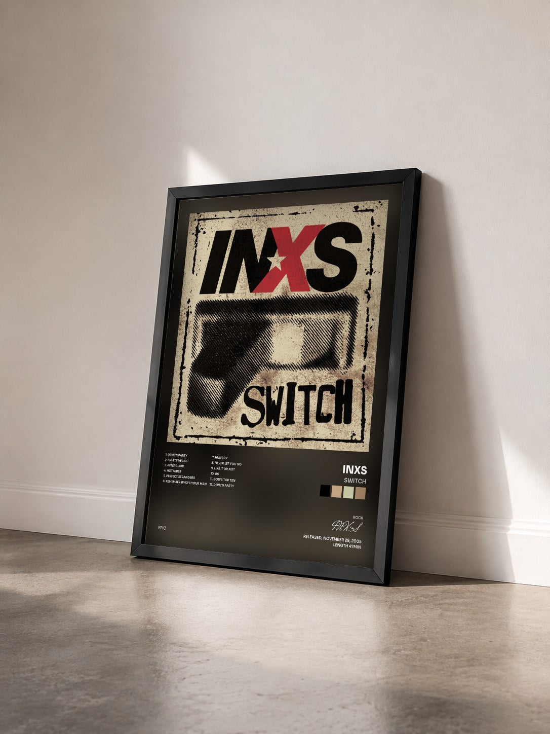 #noir Tableau de l'album Switch de INXS vu de trois quarts, cadre noir
