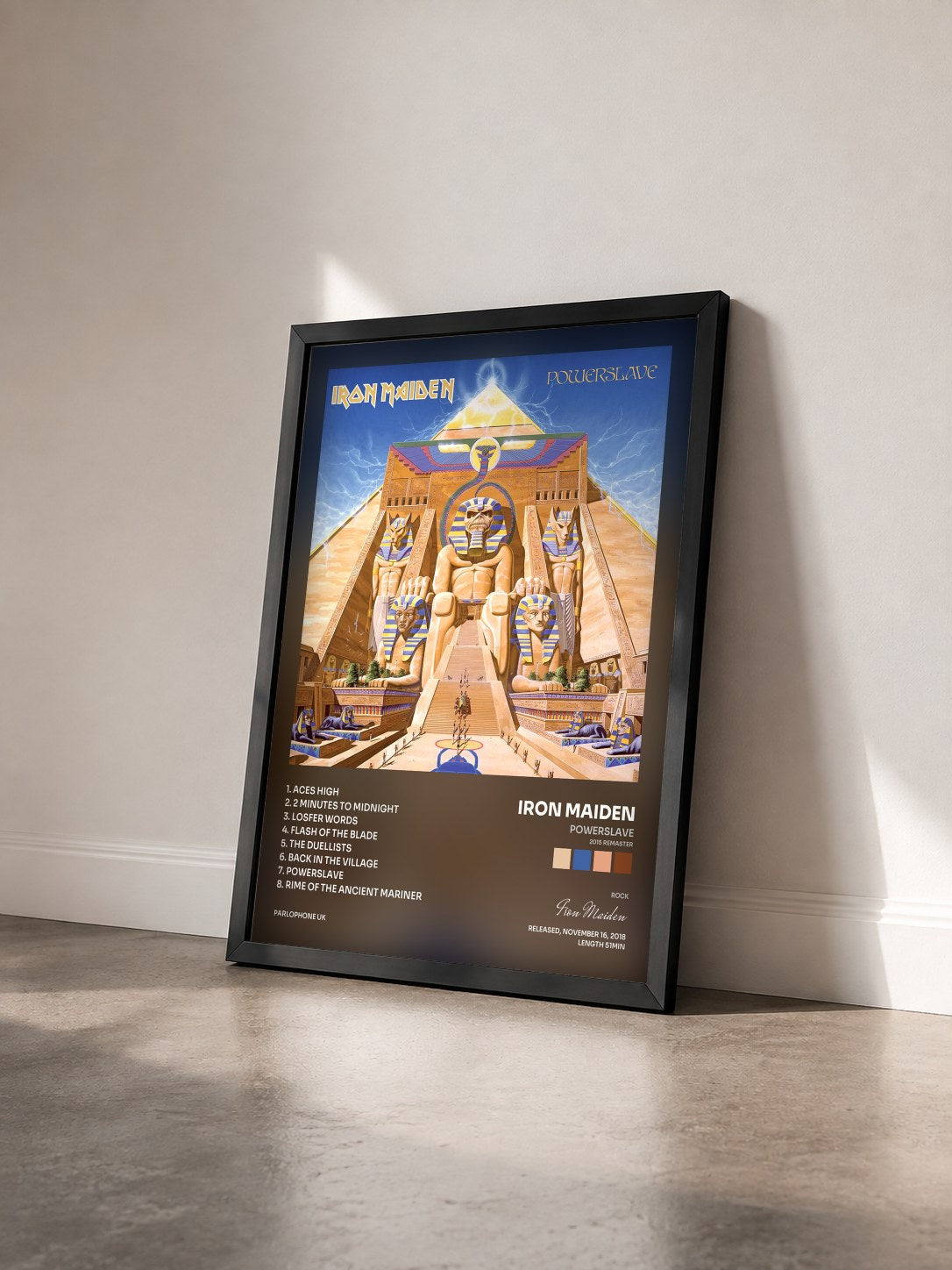 #noir Powerslave (2015 Remaster) by Iron Maiden as a framed art print seen at an angle, black frame