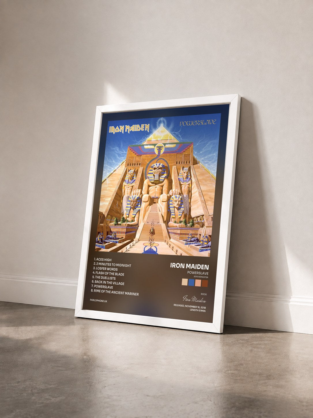 #blanc Powerslave (2015 Remaster) by Iron Maiden as a framed art print seen at an angle, white frame