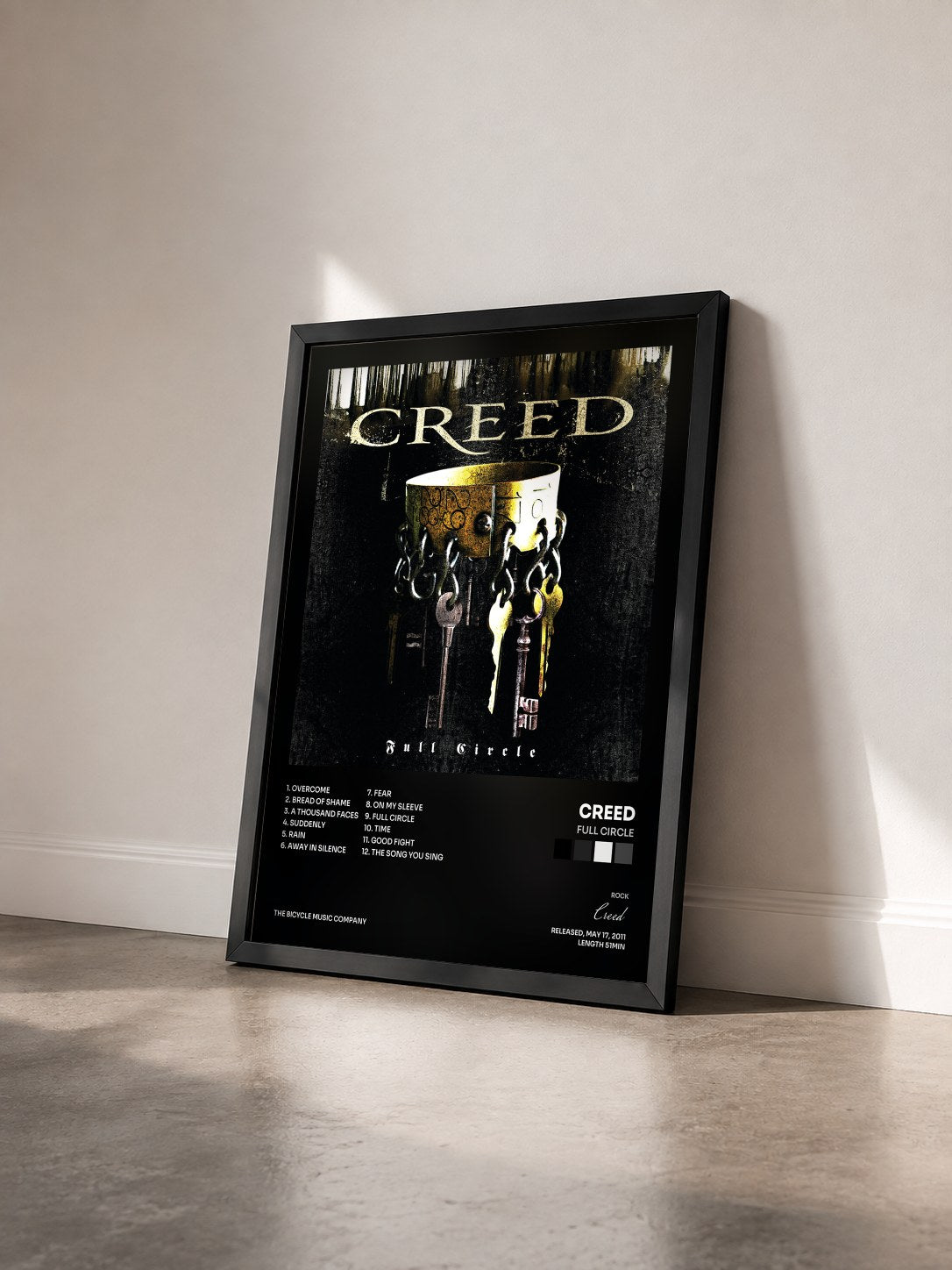 #noir Tableau de l'album Full Circle de Creed vu de trois quarts, cadre noir